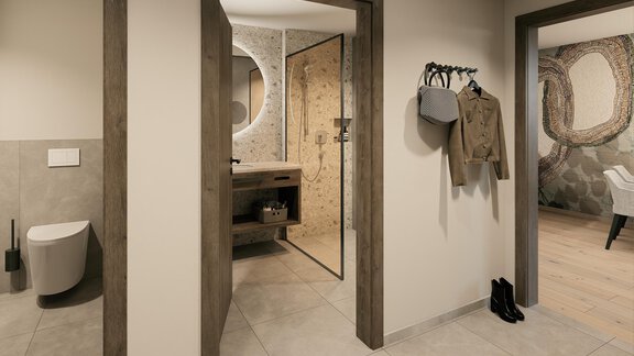 A modern bathroom with a shower and a sink as well as stylish tiles. Clothes and bags are hanging on the wall, and the floor is bright and inviting. - Ferienwohnung de Luxe Alpenresidenz am Mühlbach - Obergurgl 