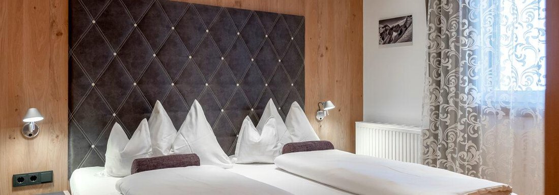Hotel-Angerer-Alm_Juniorsuite_Doppelbett-1198x799[ - Hotel Angerer Alm - Hochgurgl
