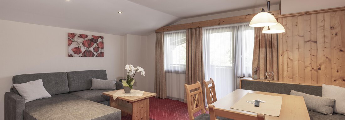 Wohnzimmer_TypLandhaus - Appartements Panorama - Längenfeld